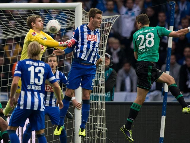 Schalke's Adam Szalai heads in the opening goal against Hertha on November 2, 2013