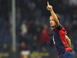 Genoa's Alberto Gilardino celebrates after scoring the opening goal against Parma on October 30, 2013