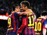 Barcelona's Alexis Sanchez celebrates with teammate Neymar after scoring the opening goal against Espanyol on November 1, 2013