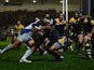 Bath's Anthony Perenise powers his way through the Worcester Warriors players to score a try on November 11, 2013