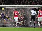 Arsenal's Welsh midfielder Aaron Ramsey scores his team's second goal during the English Premier League football match between Arsenal and Liverpool at the Emirates Stadium in north London, on November 2, 2013