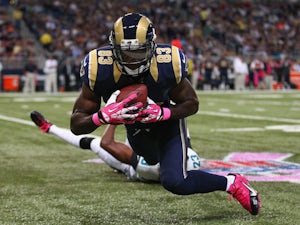 Brian Quick of the St. Louis Rams catches a pass against the Jacksonville Jaguars at the Edward Jones Dome on October 6, 2013