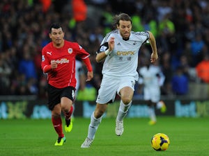 Team News: Michu back in squad