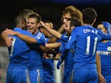 Ramires of Chelsea is congratulated by Cesar Azpilicueta and team mates after his goal during the Capital One Cup Fourth Round match between Chelsea and Manchester United at Stamford Bridge on October 31, 2012