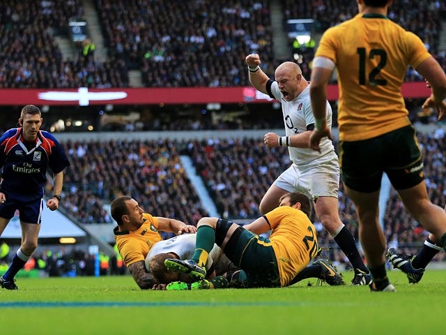England's Chris Robshaw crosses the tryline to score his team's opening try against Australia on November 2, 2013