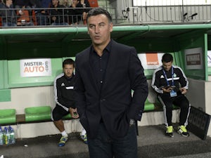 Saint-Etienne's French coach Christophe Galtier waits before the begining of the French L1 football match Saint-Etienne vs Toulouse on September 20, 2013
