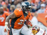 Denver Broncos' CJ Anderson runs with the ball during the game against Washington Redskins on October 27, 2013