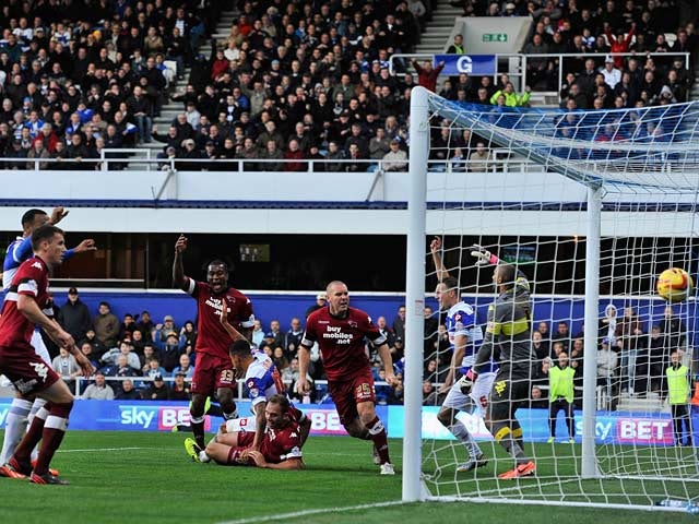 QPR's Clint Hill scores his team's second goal against Derby during their Championship match on November 2, 2013
