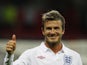 England midfielder David Beckham gives the thumbs-up to fans after winning their World Cup qualifying match against Andorra, Wembley Stadium, in London, England, on June 10, 2009