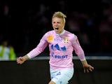 Evian's Danish defender Daniel Wass jubilates after scoring a goal during the French L1 football match Evian (ETGFC) vs Toulouse (FC) on November 2, 2013