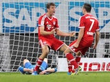 Bayern's Thomas Mueller celebrates with teammate Franck Ribery after scoring the his team's second goal against Hoffenheim on November 2, 2013