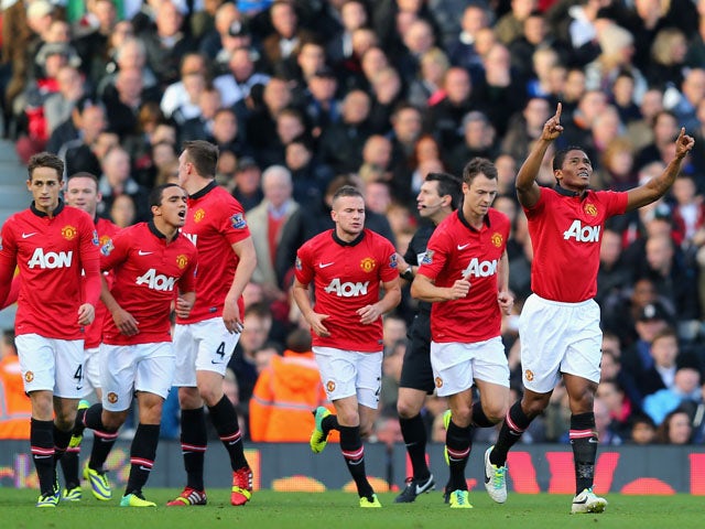 Luis Antonio Valencia of Manchester United celebrates scoring the first goal during the Barclays Premier League match between Fulham and Manchester United at Craven Cottage on November 2, 2013