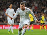Real's Gareth Bale celebrates after scoring the opening goal against Sevilla on October 30, 2013