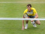 Jamie Murray of Great Britain reacts during the Men's Doubles first round match with John Peers of Australia against Grigor Dimitrov of Bulgaria and Frederick Nielsen of Denmark on day three of the AEGON Championships at Queens Club on June 12, 2013