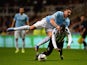 Man City's Javi Garcia and Newcastle's Massadio Haidara battle for the ball during their Capital One Cup Fourth Round match on October 30, 2013