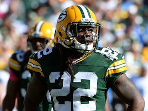 Jerron McMillian #22 of the Green Bay Packers waits for play against the Detroit Lions at Lambeau Field on October 6, 2013