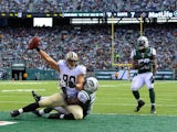 Tight end Jimmy Graham of the New Orleans Saints makes a touchdown catch in the 2nd quarter against the New York Jets at MetLife Stadium on November 3, 2013