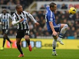 Chelsea's John Terry and Newcastle's Loic Remy battle for the ball on November 2, 2013