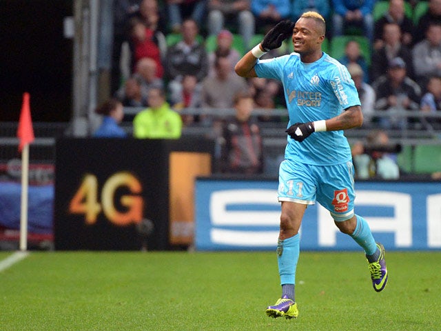 Marseille's Jordan Ayew celebrates moments after scoring the eqauliser against Rennes on November 2, 2013