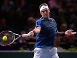 Juan Martin Del Potro in action against Marin Cilic during round two of the Paris Masters on October 30, 2013