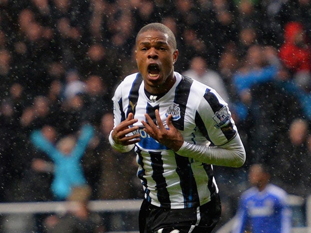 Newcastle's Loic Remy celebrates after scoring his team's second goal against Chelsea on November 2, 2013