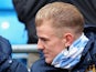 Joe Hart of Manchester City sits on the bench during the Barclays Premier League match between Manchester City and Norwich City at Etihad Stadium on November 2, 2013