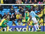Matija Nastasic of Manchester City scores their third goal during the Barclays Premier League match between Manchester City and Norwich City at Etihad Stadium on November 2, 2013
