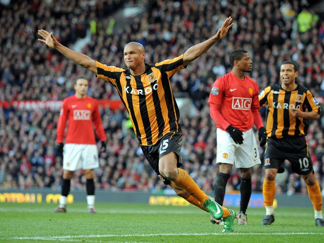 Hull City's French-Gabonese forward Daniel Cousin celebrates after scoring during the English Premier league football match against Manchester United at Old Trafford, Manchester , north-west England, on November 1 2008