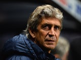 Man City manager Manuel Pellegrini prior to kick-off against Newcastle in their Capital One Cup Fourth Round match on October 30, 2013