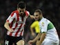 Athletic Bilbao's midfielder Markel Susaeta vies with Elche's defender Lomban during the Spanish league football match on October 31, 2013