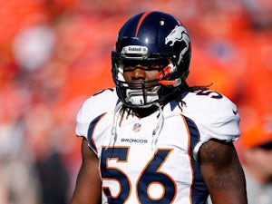Linebacker Nate Irving #56 of the Denver Broncos in action during player warm-ups prior to the game against the Kansas City Chiefs at Arrowhead Stadium on November 25, 2012