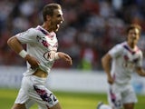 Bordeaux's French midfielder Gregory Sertic celebrates after scoring a goal during the French L1 football match between Nice and Bordeaux at the Allianz Riviera stadium in Nice, southeastern France, on November 3, 2013