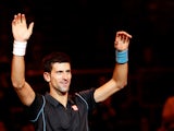 Novak Djokovic celebrates his win over Stanislas Wawrinka during the quarter finals of the Paris Masters on November 1, 2013