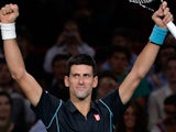 Novak Djokovic celebrates his win over Roger Federer during the semi finals of the Paris Masters on November 2, 2013