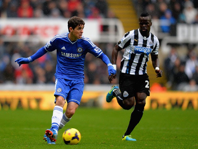 Chelsea's Oscar and Newcastle's Cheik Tiote in action during their Premier League match on November 2, 2013