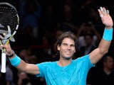 Rafael Nadal celebrates his win over Richard Gasquet during the quarter finals of the Paris Masters on November 1, 2013