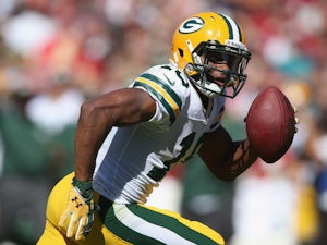 Cobb hat-trick helps Packers to victory
