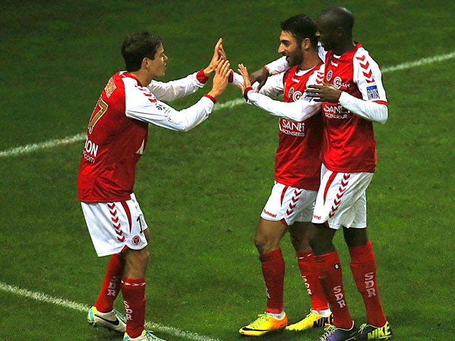 Reims' Eliran Atar celebrates after scoring a goal during the French L1 football match Reims vs Bastia on November 2, 2013