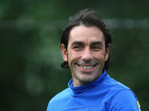 Pires 'punched' by rival coach