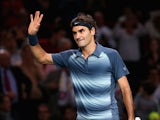 Roger Federer celebrates his win over Kevin Anderson during round two of the Paris Masters on October 30, 2013