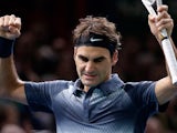 Roger Federer celebrates his win over Juan Martin Del Potro during the quarter finals of the Paris Masters on November 1, 2013