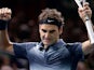 Roger Federer celebrates his win over Juan Martin Del Potro during the quarter finals of the Paris Masters on November 1, 2013