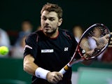 Stanislas Wawrinka in action against Feliciano Lopez during round two of the Paris Masters on October 30, 2013