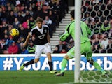 Jay Rodriguez of Southampton scores their first goal past Asmir Begovic of Stoke City during the Barclays Premier League match between Stoke City and Southampton on November 02, 2013