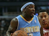 Ty Lawson of the Denver Nuggets in action against the Chicago Bulls during a preseason game at the United Center on October 25, 2013
