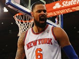 Tyson Chandler of the New York Knicks celebrates a blocked shot against the Milwaukee Bucks during their game at Madison Square Garden on October 30, 2013