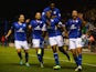 Wes Morgan of Leicester City is mobbed by team mates after scoring his goal during the Capital One Cup fourth round match against Fulham on October 29, 2013