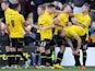 Burton's Adam McGurk is congratulated by teammates after scoring the opening goal against Hereford on November 10, 2013