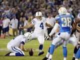 Adam Vinateri of the Indianapolis Colts kick a field goal against San Diego Chargers at Qualcomm Stadium October 14, 2013