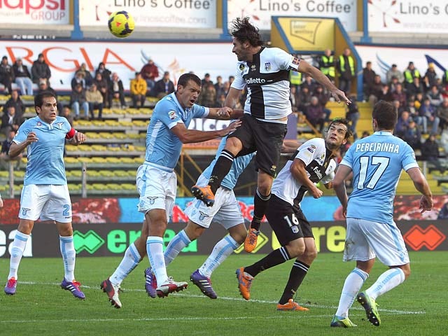 Parma's Alessandro Lucarelli heads in the equaliser against Lazio on November 10, 2013